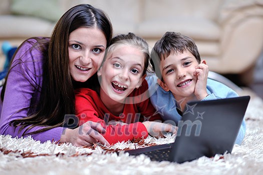 happy young family with mom and kids have fun and play in modern new living room home indoor happy young family with mom and kids have fun and play in modern new living room home indoor