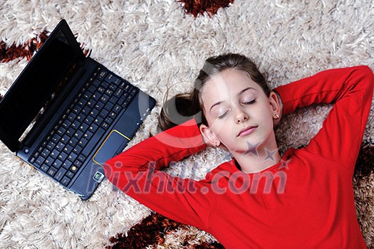happy child school girl relax at home with laptop computer in background happy child school girl relax at home with laptop computer in background