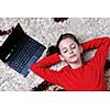 happy child school girl  relax at home with laptop computer in background