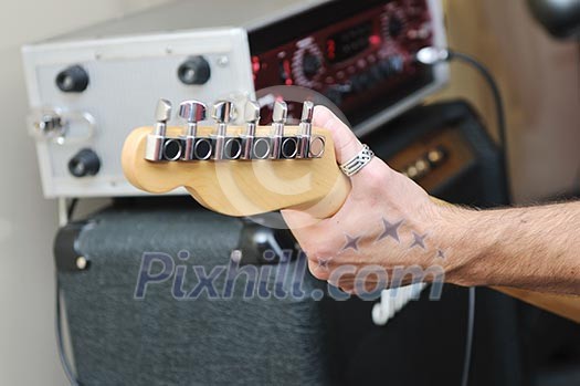 young music player and band friends have training in home garage young music player and band friends have training in home garage