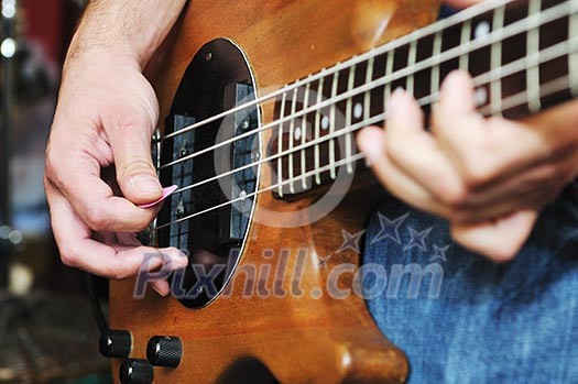 young music player and band friends have training in home garage young music player and band friends have training in home garage