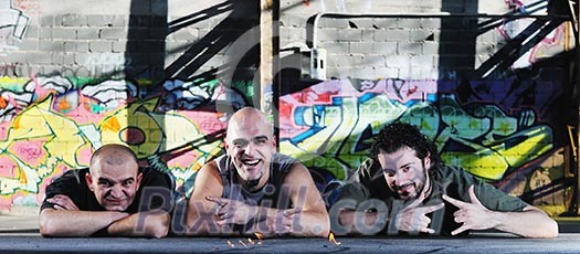 group of three adult man outdoor in the city at the sunset representing urban and modern everyday scene group of three adult man outdoor in the city at the sunset representing urban and modern everyday scene