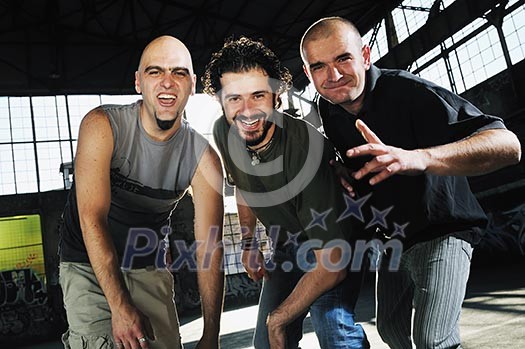 group of three adult man outdoor in the city at the sunset representing urban and modern everyday scene group of three adult man outdoor in the city at the sunset representing urban and modern everyday scene