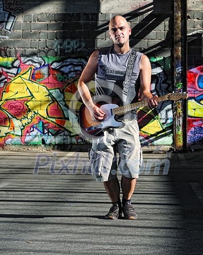 young music player playing guitar instrument young music player playing guitar instrument