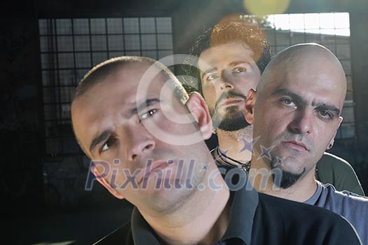 group of three adult man outdoor in the city at the sunset representing urban and modern everyday scene group of three adult man outdoor in the city at the sunset representing urban and modern everyday scene