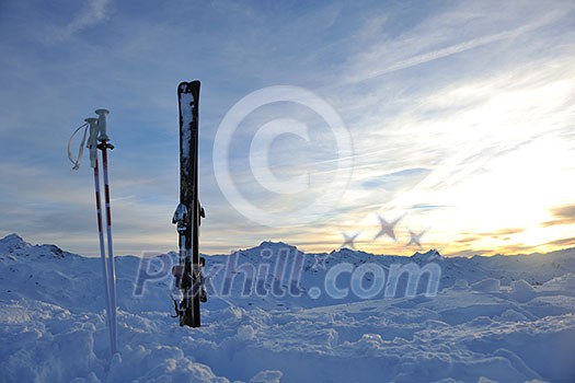 mountain snow ski with beautiful sunset in background