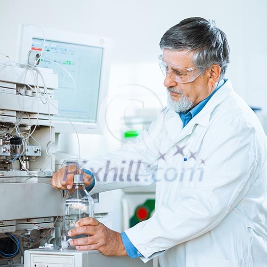 Senior male researcher carrying out scientific research in a lab (shallow DOF; color toned image) Senior male researcher carrying out scientific research in a lab (shallow DOF; color toned image)