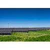 Sunlight as a resource of renewable energy: solar panels on a sunny day