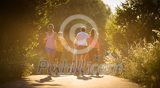 Young woman running outdoors on a lovely sunny summer evening (shallow DOF; color toned image)