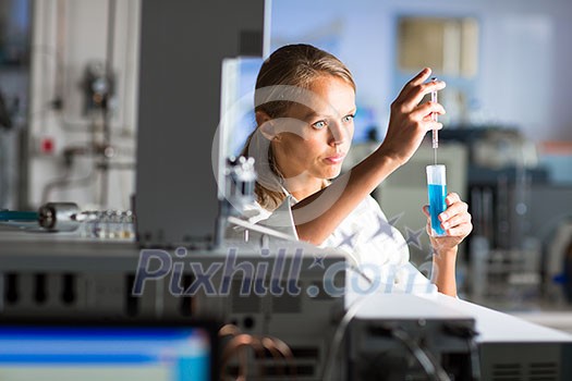 Portrait of a female researcher doing research in a lab (shallow DOF; color toned image) Portrait of a female researcher doing research in a lab (shallow DOF; color toned image)