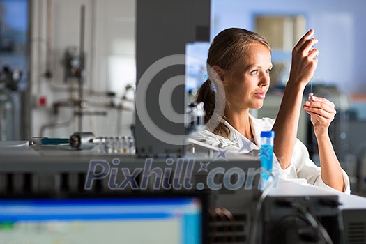 Portrait of a female researcher doing research in a lab (shallow DOF; color toned image) Portrait of a female researcher doing research in a lab (shallow DOF; color toned image)