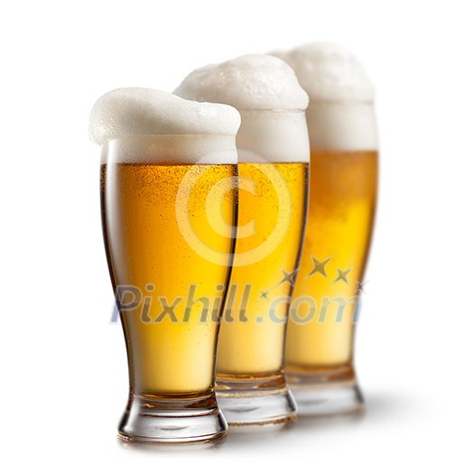 Beer in glasses isolated on white background Beer in glasses isolated on white background
