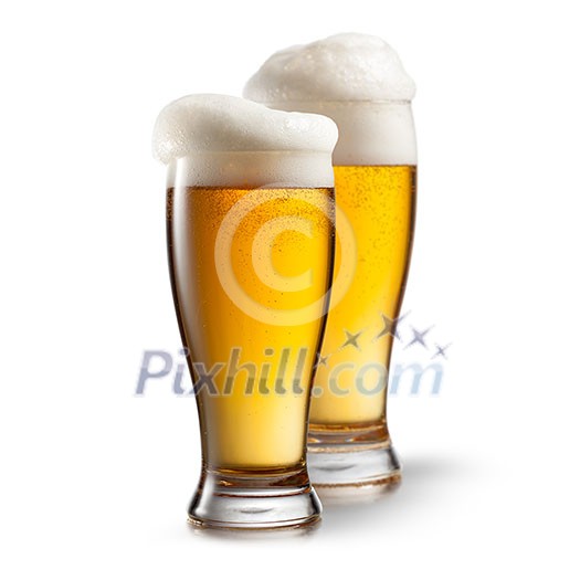 Beer in glasses isolated on white background Beer in glasses isolated on white background