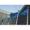 European Union flags in front of the Berlaymont building (European commission) in Brussels, Belgium.