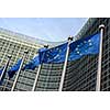 European Union flags in front of the Berlaymont building (European commission) in Brussels, Belgium.