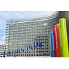 Brussels, Belgium – February 24, 2014: Photo of European Union flags in front of the Berlaymont building (European commission)