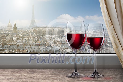 View of Paris and Eiffel tower from window with two glasses of wine View of Paris and Eiffel tower from window with two glasses of wine