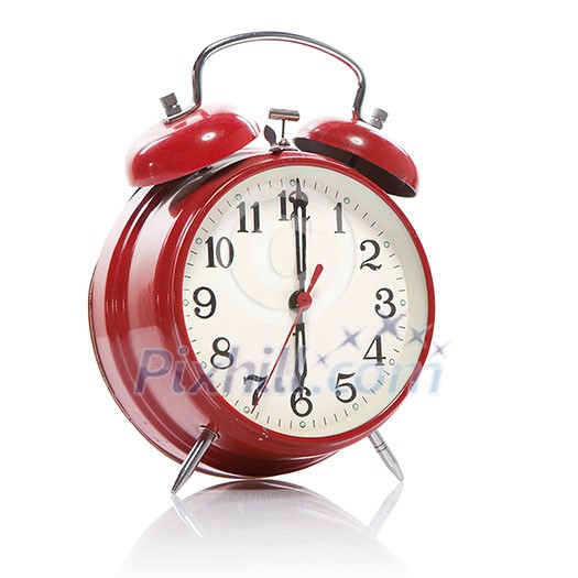 red old style alarm clock isolated on white red old style alarm clock isolated on white