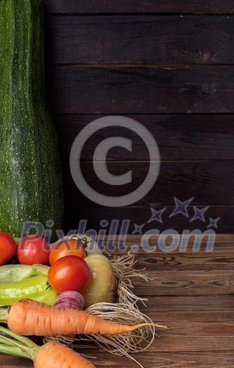 Fresh vegetables on a wooden table. Rustic style. Vegetarianism. Organic food. Space for text. Fresh vegetables on a wooden table. Rustic style. Vegetarianism. Organic food. Space for text.