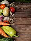 Fresh vegetables on a wooden table. Rustic style. Vegetarianism. Organic food. Space for text.