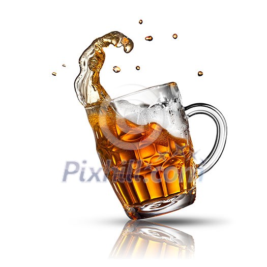 Beer splash in glass isolated on white Beer splash in glass isolated on white