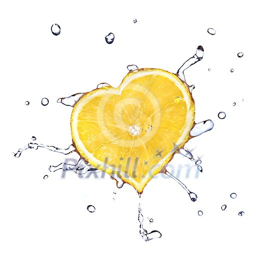 heart from lemon dropped into water isolated on white heart from lemon dropped into water isolated on white