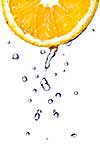 fresh water drops on orange isolated on white
