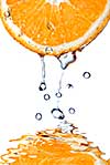 fresh water drops on grapefruit isolated on white