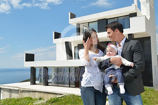 happy young family couple with beautiful new born baby have fun at home happy young family couple with beautiful new born baby have fun at home
