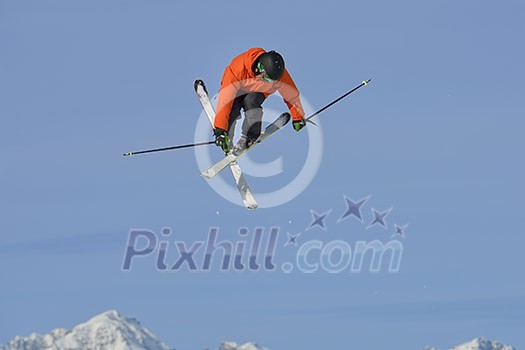 jumping skier at mountain winter snow fresh suny day jumping skier at mountain winter snow fresh suny day