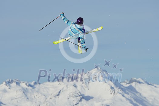 jumping skier at mountain winter snow fresh suny day jumping skier at mountain winter snow fresh suny day