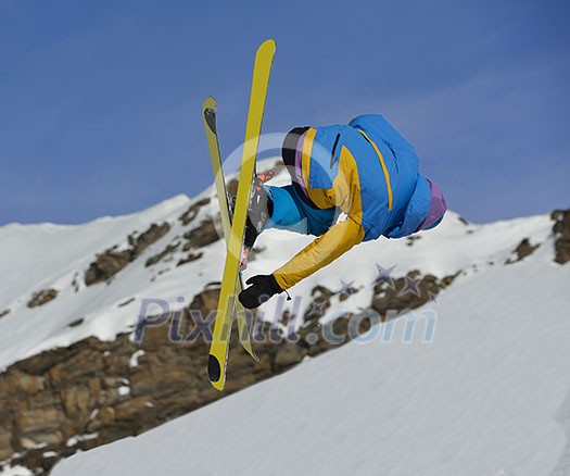 jumping skier at mountain winter snow fresh suny day jumping skier at mountain winter snow fresh suny day