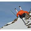 jumping skier at mountain winter snow fresh suny day