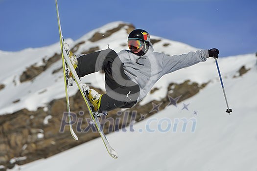 jumping skier at mountain winter snow fresh suny day jumping skier at mountain winter snow fresh suny day