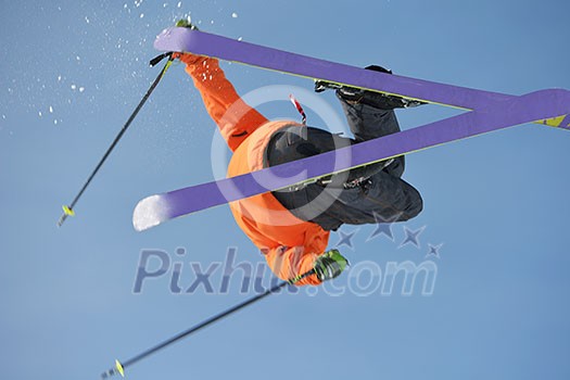 jumping skier at mountain winter snow fresh suny day jumping skier at mountain winter snow fresh suny day