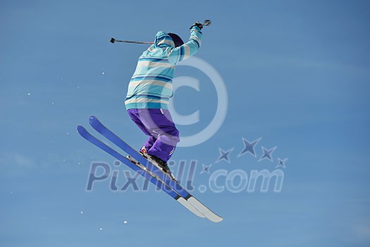 jumping skier at mountain winter snow fresh suny day jumping skier at mountain winter snow fresh suny day