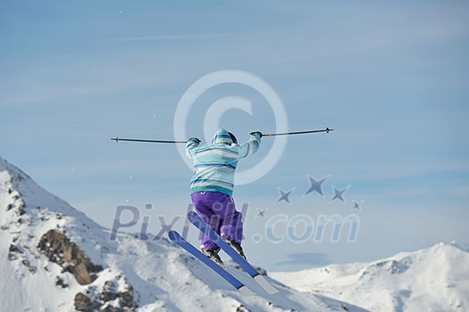 jumping skier at mountain winter snow fresh suny day jumping skier at mountain winter snow fresh suny day