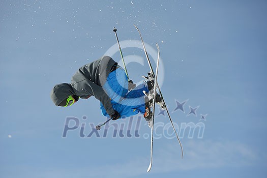 jumping skier at mountain winter snow fresh suny day jumping skier at mountain winter snow fresh suny day