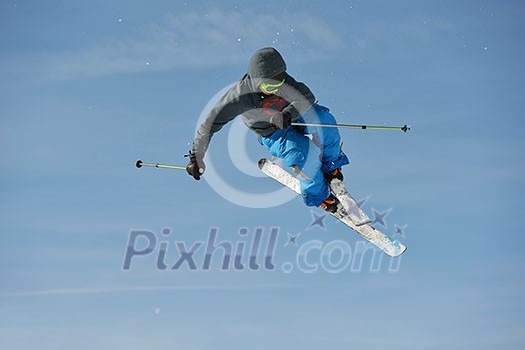 jumping skier at mountain winter snow fresh suny day jumping skier at mountain winter snow fresh suny day