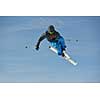 jumping skier at mountain winter snow fresh suny day