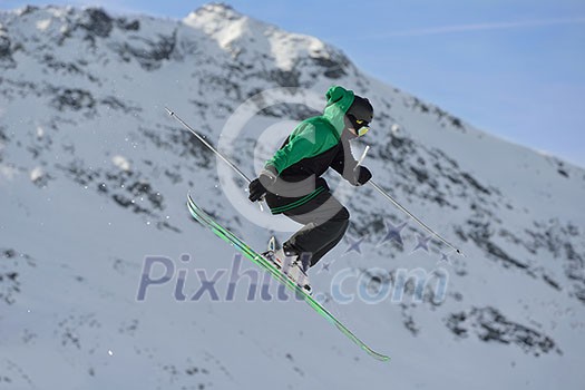jumping skier at mountain winter snow fresh suny day jumping skier at mountain winter snow fresh suny day