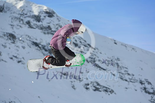 jumping skier at mountain winter snow fresh suny day jumping skier at mountain winter snow fresh suny day