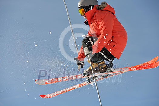 jumping skier at mountain winter snow fresh suny day jumping skier at mountain winter snow fresh suny day