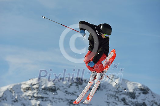 jumping skier at mountain winter snow fresh suny day jumping skier at mountain winter snow fresh suny day
