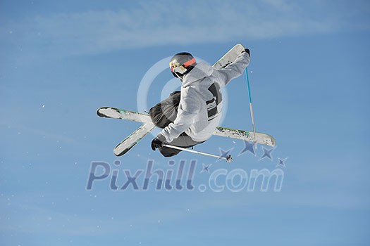 jumping skier at mountain winter snow fresh suny day jumping skier at mountain winter snow fresh suny day