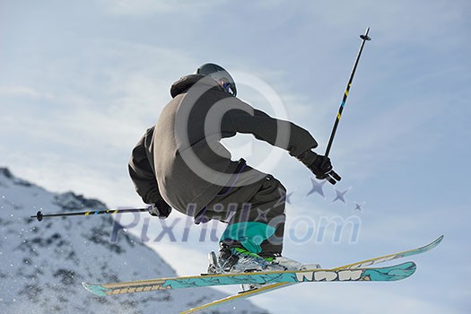 jumping skier at mountain winter snow fresh suny day jumping skier at mountain winter snow fresh suny day