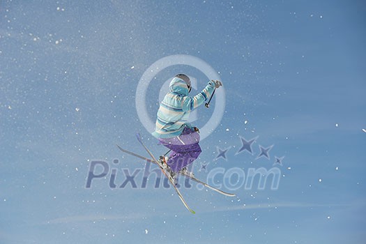 jumping skier at mountain winter snow fresh suny day jumping skier at mountain winter snow fresh suny day