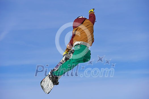 jumping skier at mountain winter snow fresh suny day jumping skier at mountain winter snow fresh suny day