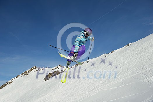 jumping skier at mountain winter snow fresh suny day jumping skier at mountain winter snow fresh suny day