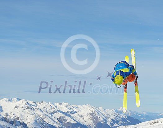 jumping skier at mountain winter snow fresh suny day jumping skier at mountain winter snow fresh suny day